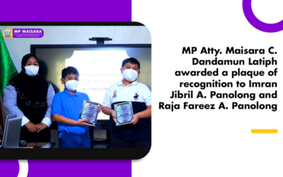 MP Atty. Maisara C. Dandamun Latiph awarded a plaque of recognition to Imran Jibril A. Panolong and Raja Fareez A. Panolong.